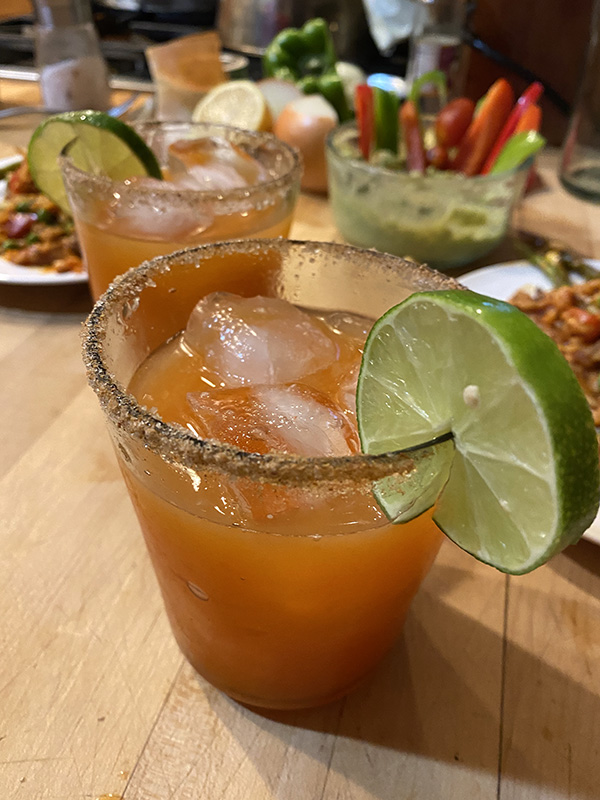 The Día de los Muertos is bright and beautiful with a rim and a lime garnish.