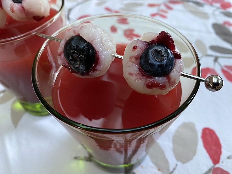 The Killer Clown mocktail features garnishes that look like bloody eyeballs.
