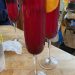 Two Mimosas are garnished with orange slices, and a Faux-mosa gets an umbrella.