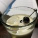The creamy White Whale cocktail resembles Moby Dick, with a dark cherry for an eye, and a copy of the book behind it.